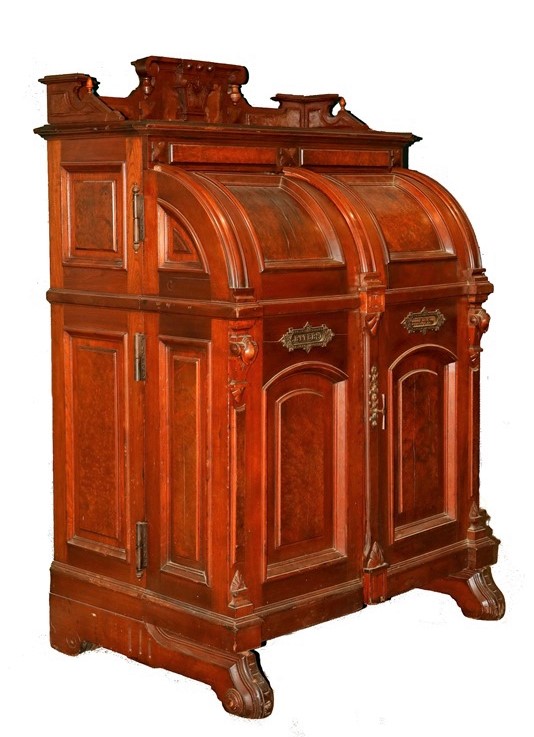 Wooten desk with raised burled panels. Courtesy of Thomaston Place Auction Galleries Wooten desk