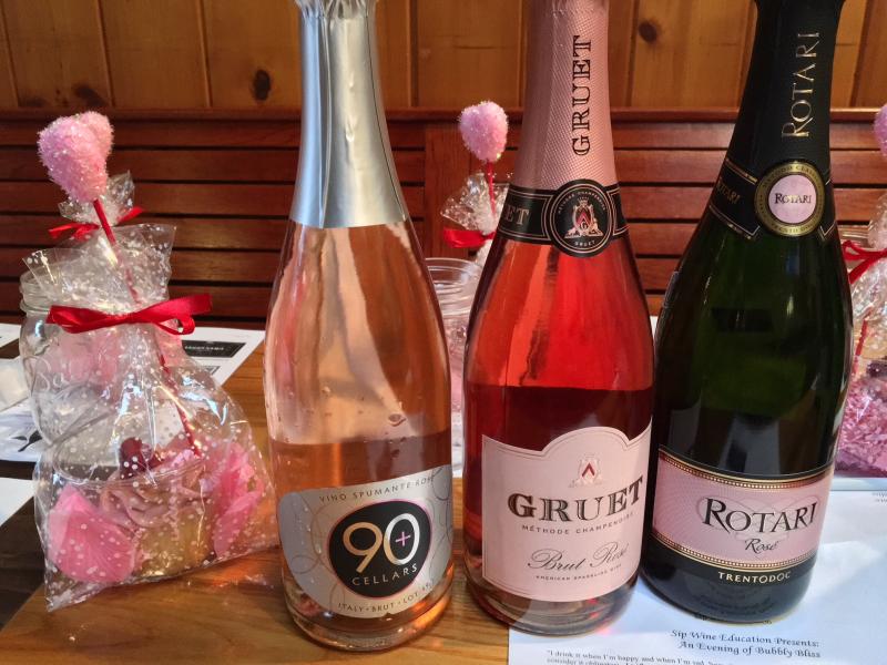 A few of the bottles of bubblies, and a Mammy’s Bakery cupcake, at the Carriage House on Jan. 27. SUZI THAYER/Boothbay Register