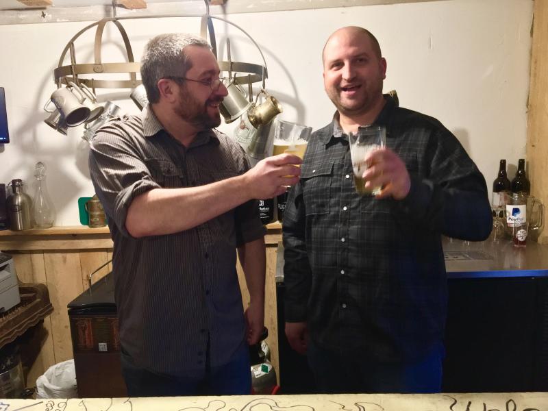 Dan Pangburn, left, toasts his best friend and Footbridge Brewery partner, Nick Ulo. SUZI THAYER/Boothbay Register