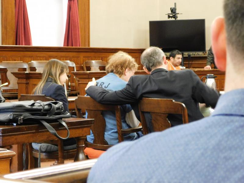 Sharon Carrillo’s lawyer comforts her as she cries in court. (photo by Erica Thoms)