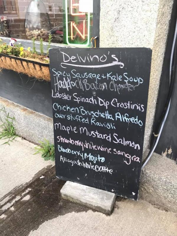 A specials board on the sidewalk outside Delvino’s in Belfast. (Photo courtesy of Delvino’s)
