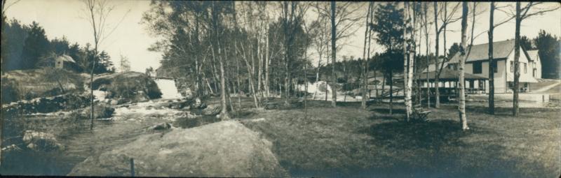 Panoramic view of the two dams at the outlet of Megunticook River. To the left is the old saw mill building. To the right is the old grist mill that became the site of the fish hatchery. Today, they are referred to as the East and West Dams and were given to the Town of Camden. The land and buildings surrounding the dams are on private property.