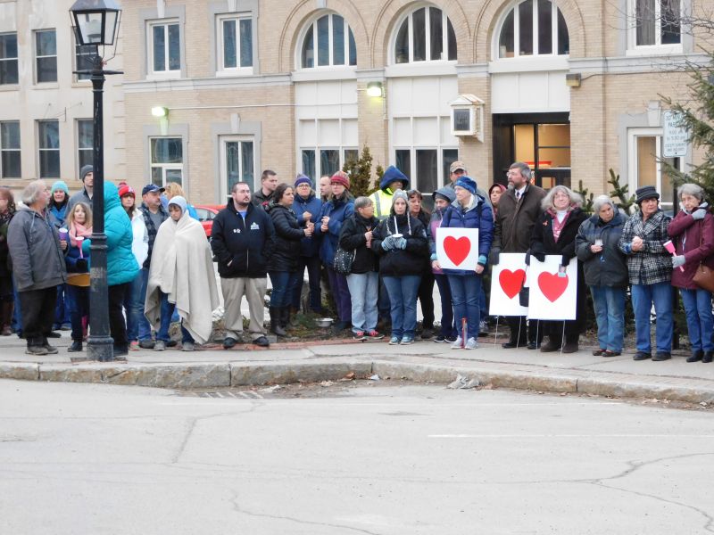 A crowd gathers in Belfast Town Square for a vigil for Marissa Kennedy,
the little girl allegedly slain by her mother and stepfather. (photo by Erica Thoms)