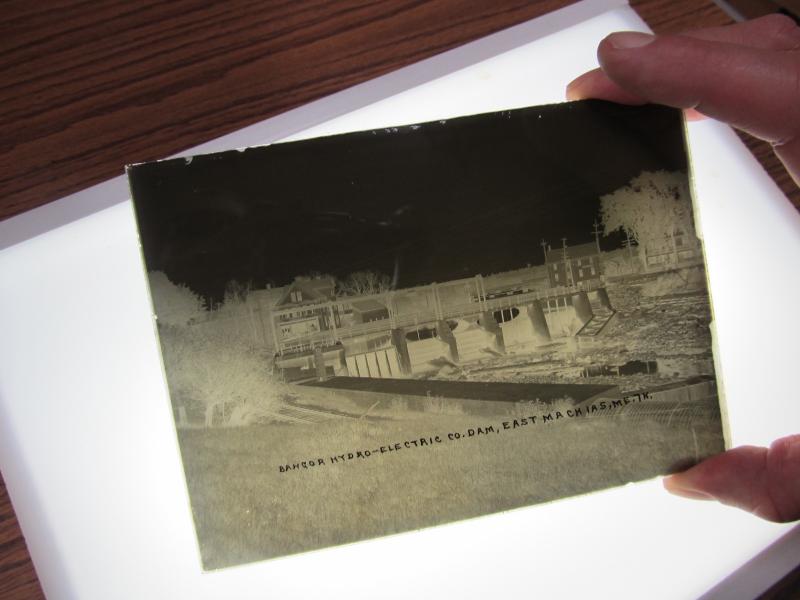 A photo against a light box. Photo by Kay Stephens (with permission from Penobscot Marine Museum).