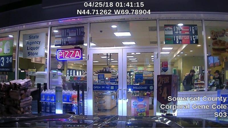 Suspect at the counter. (Photo courtesy Maine Office of Public Safety)
