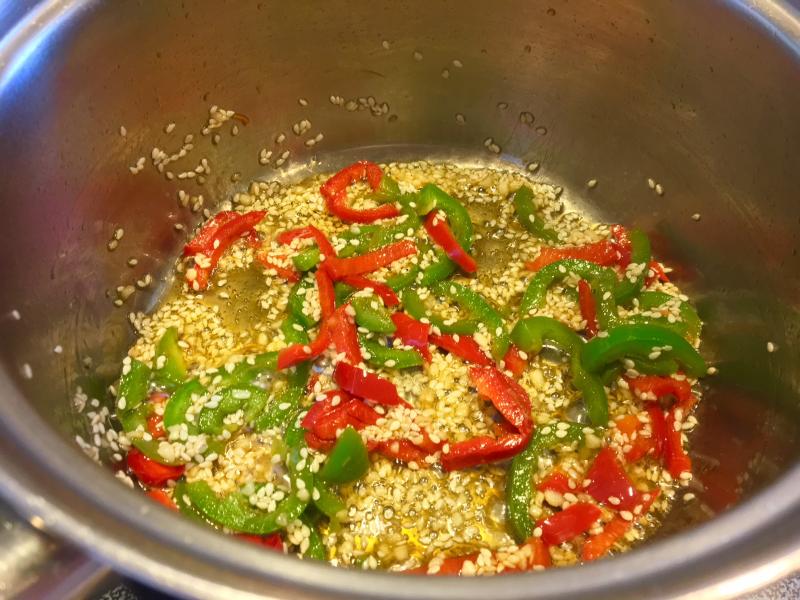 Sauteed jalapeno peppers and sesame seeds in toasted sesame oil. SUZI THAYER/Boothbay Register