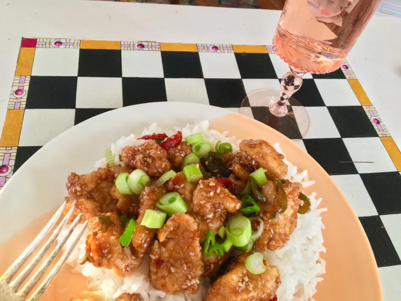 Crispy sesame chicken with a sticky Asian sauce paired with a beautiful pink glass of rose. SUZI THAYER/Boothbay Register