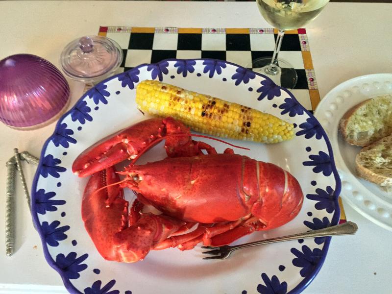 Lobster and roasted corn-on-the-cob, at the cottage. SUZI THAYER/Boothbay Register