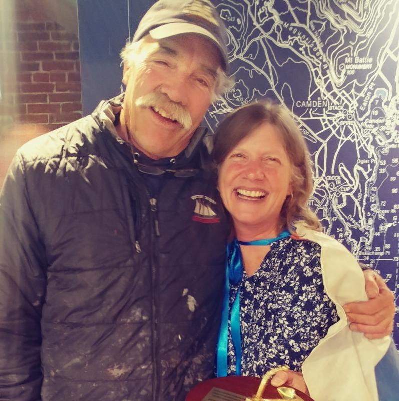 Meg Maiden receives a hug from Kip Files, Captain of the Victory Chimes. (Photo courtesy Marti Mayne/Maine Windjammer Association)