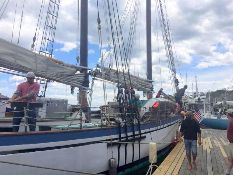 The Appledore crew secure their boat to the dock