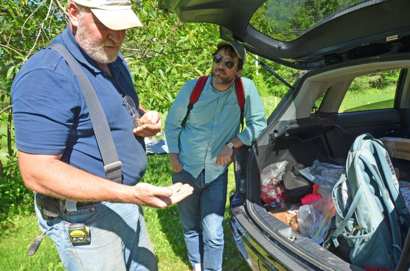 Harbour Mitchell, Union archeologist, and Brett Willard take a look at the latest findings from an old settlement. (Photo by Lynda Clancy)