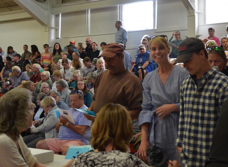 Registering to vote. June 11, Camden-Rockport Middle School gym. (Photo by Lynda Clancy)