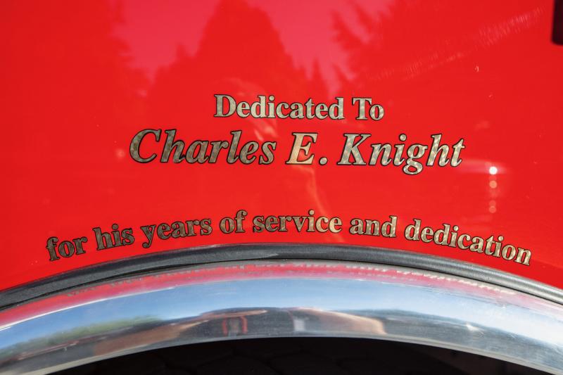 The inscription honoring Charlie Knight on Rockport's new firetruck. (Photo by Peter Ralston)