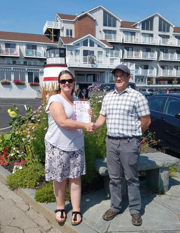 Aimee Liberty, General Manager of the Trade Winds Inn and Jason Merriam, Rockland Main Street, Inc. Design Committee Co-chair. (Photo courtesy of Rockland Main St.)