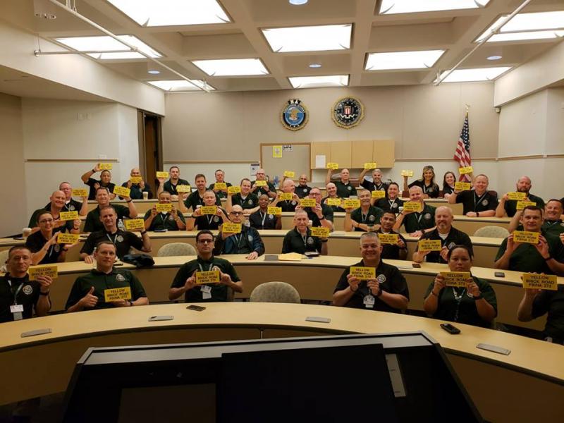 Members of the 273rd session pose with their yellow bricks. (photo courtesy of Chief Deputy Trundy)