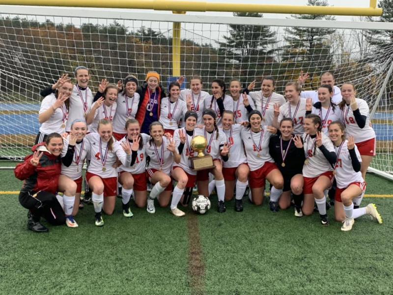Camden Hills celebrating its third consecutive state championship. (Courtesy Steve Alex)