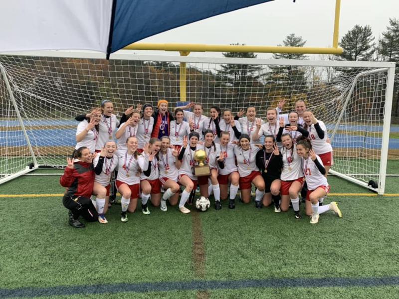 Camden Hills celebrating its third consecutive state championship. (Courtesy Steve Alex)