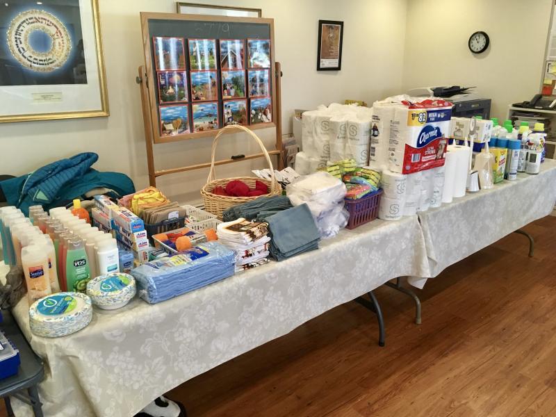 Collecting items to assemble Welcome Home Kits. (Photo courtesy of Elizabeth Siegel)