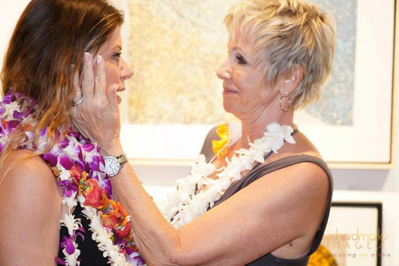 DeHoff gets an appreciative embrace from friend Debbie Principato. (Photo courtesy Richard Marks Images)