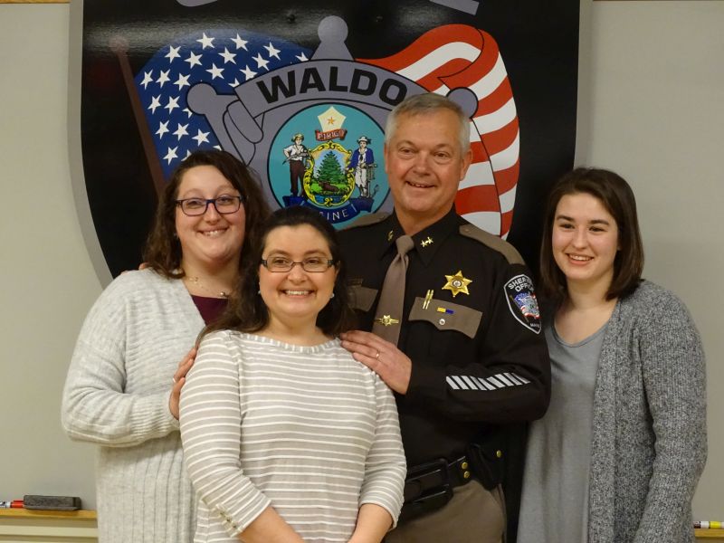 Trafton with daughters (left to right): Lindsay Page, Amanda Gurney, and Britney Mayer. (photo by Erica Thoms)