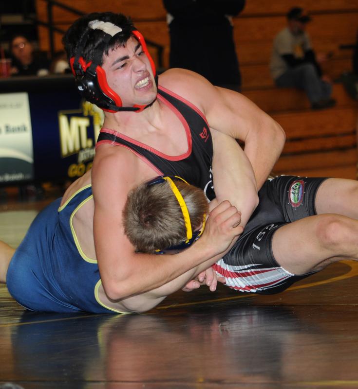 Drew Kelly pinning a Mount Blue wrestler. (Courtesy Glenn Lang)