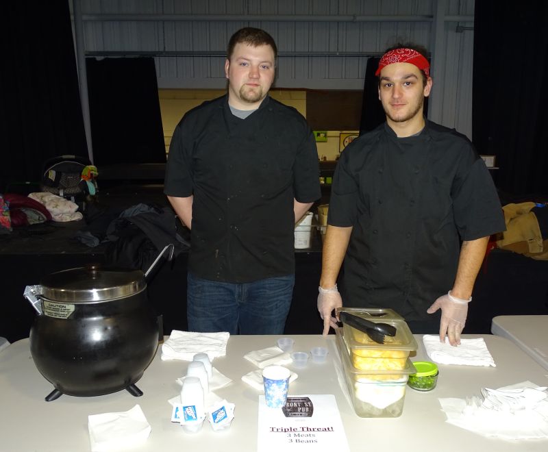 Gary Frost (left) and Dakota Walker (right) represented Front Street Pub and said their chili has a lot of organic ingredients, as well as stout beer. Frost said most of the ingredients were purchased at the Belfast Co-op. (photo by Erica Thoms)