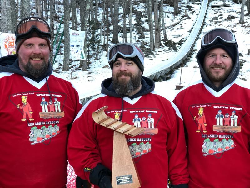 The Splittin’ Adams include Adam Way, Kevin Kempton and Adam Thurlow. The team earned a trophy for taking first place with the three-man team category at the 29th Annual Toboggan National Championships at the Camden Snow Bowl, Feb. 8-10, 2019. (Photo courtesy Tracy Boardman)