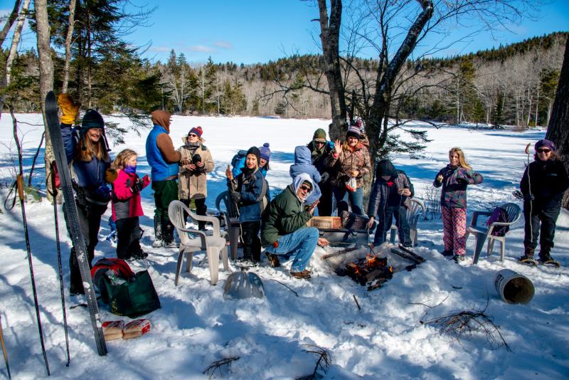 Day 4: Last day of snowshoeing, Capture-the-Flag, hotdogs and marshmallows over a campfire. St. Clair Preserve, Knights Pond, Northport. (Photo courtesy Gene Randall)