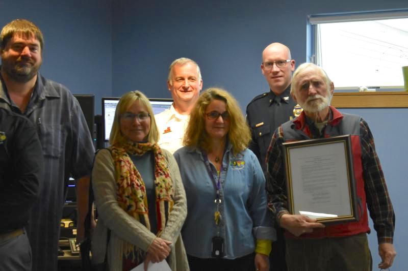 The front lines, background coordination, and business side come together to recognize Knox County dispatchers. L to R: Dispatcher Timothy McLaughlin, County Commissioner Sharyn L. Pohlman, Camden Fire Chief Chris Farley, Dispatch supervisor Stephanie Gibbs, Rockland Police Chief Chris Young, and County Commissioner Richard L. Parent, Jr.