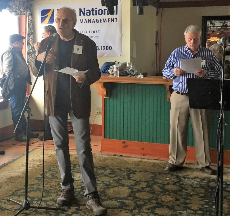 MPS Committee member Norbert Leser shares a few words about his show upstairs at Boothbay Region Art Foundation. LISA KRISTOFF/Boothbay Register Norbert Leser