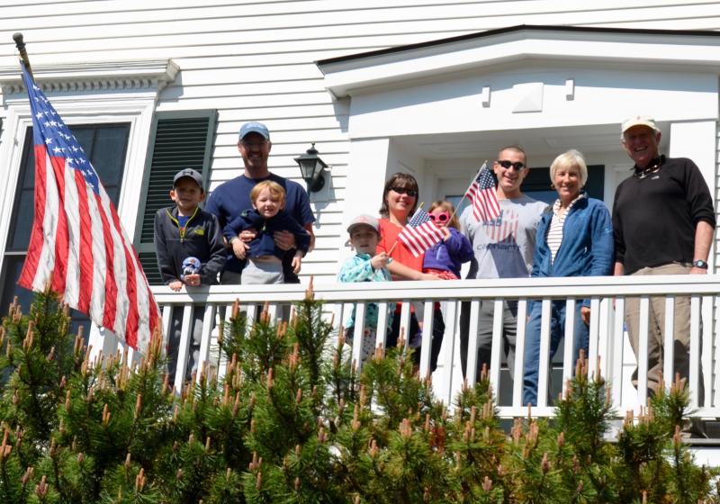 Galen and Sue Todd, and their family, gathers on Main Street in Camden to watch the Memorial Day Parade. (Photo by Lynda Clancy)