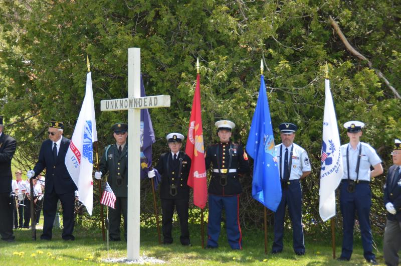 At Amsbury Hill Cemetery in Rockport, members of the American Legion 30 gather with citizens to commemorate Memorial Day. (Photo by Lynda Clancy)