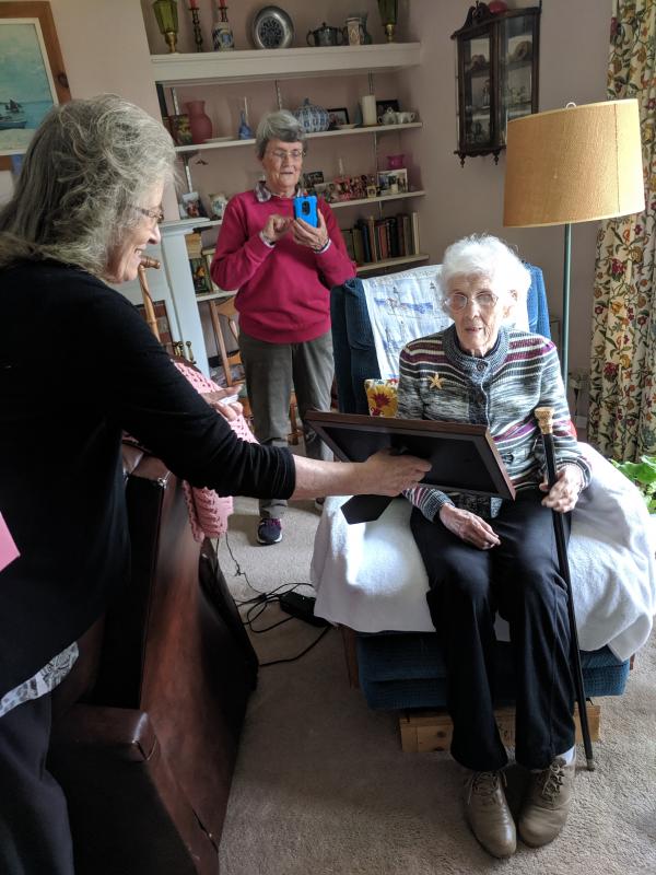 Rockport Town Clerk Linda Greenlaw presents Annie May Young Spirio with her plaque. (Photo courtesy Diane Hamilton)