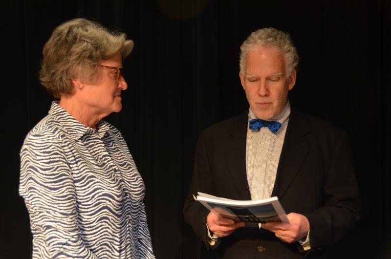 Town Meeting Moderator Deb Dodge swears in Marc Ratner for another term on the Select Board. (Photo by Lynda Clancy)
