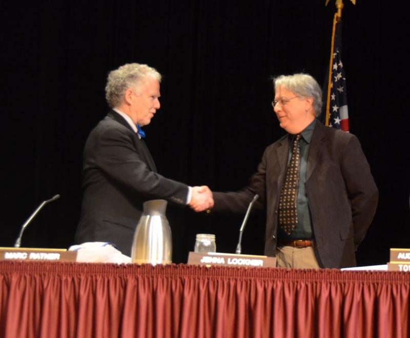 Select Board Chairman Bob Falciani congratulates Marc Ratner on his reelection. (Photo by Lynda Clancy)