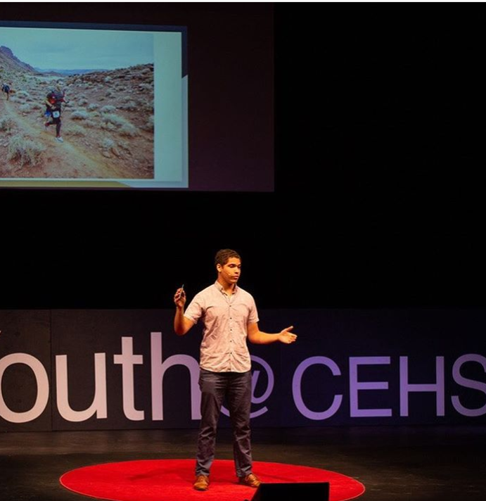 Kaylo Littlejohn speaking at a TEDx event. (Photo by TEDx Youth @ CEHS)