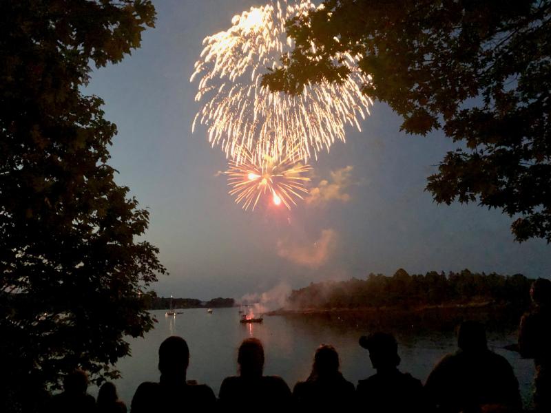 Those who found the hidden path to the overlook got a magnificent view of the fireworks over Curtis Island. (Photo by Lynda Clancy)