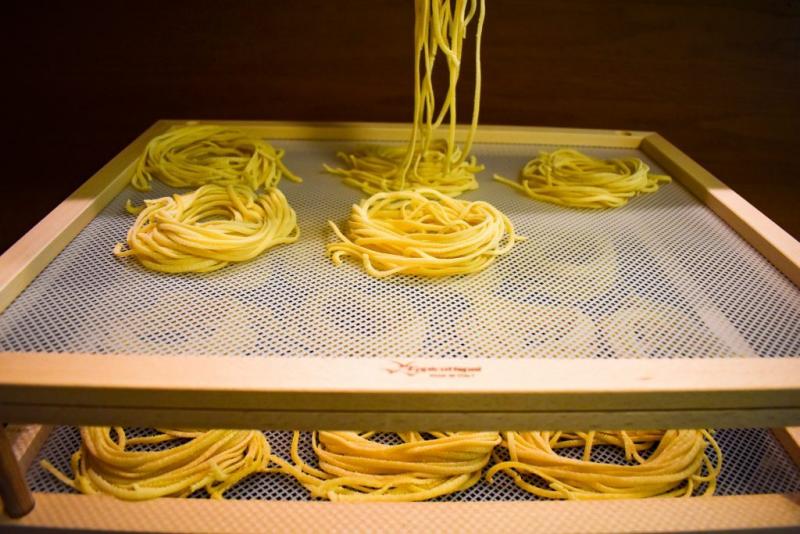 Some pasta is put into nests for a 24 hour drying period. (Courtesy Nick Grim)
