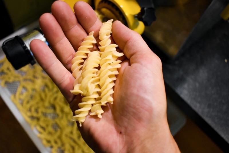 Verifying the pasta is, indeed, ready. (Courtesy Nick Grim)