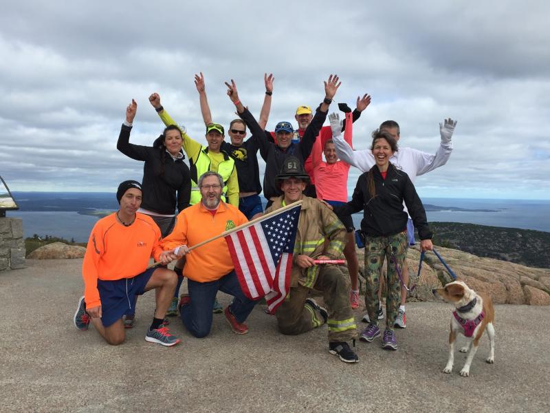 Runners pose for a picture on Cadillac Mountain during a previous year’s relay. (Photo courtesy Run2Respond)