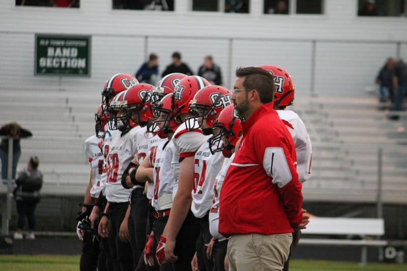 Camden Hills head football coach Jeremy Marks observes pregame drills ahead of the Sept. 6 game against Old Town. (Courtesy Sally Russillo)