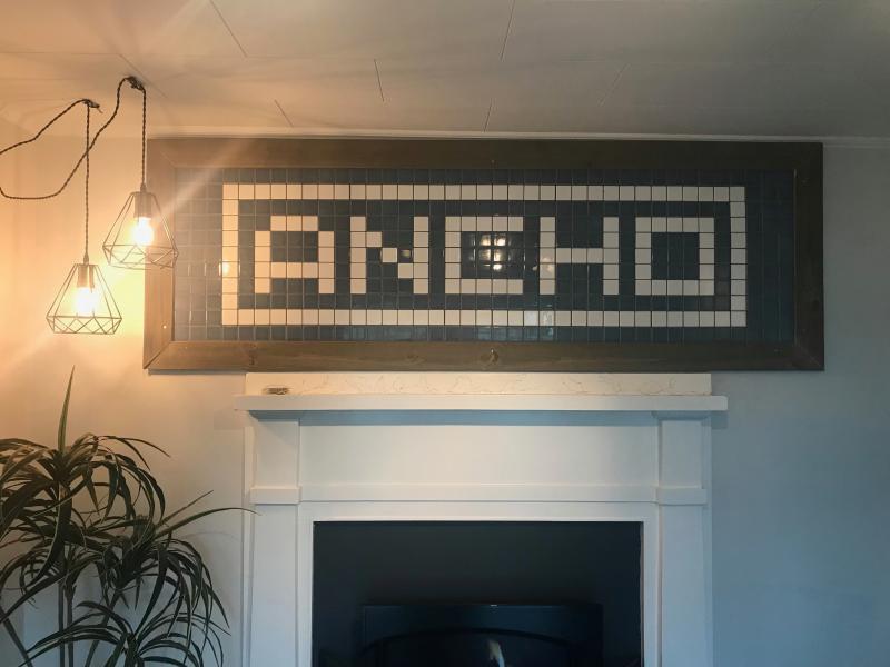 A tiled detail welcomes you to Ancho Honey. (Photo by Jenna Lookner)