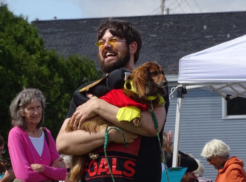Canine Costume Contest winner Franklin, being carried by his human David Butler, of Rockland. Franklin also won last year’s Costume Contest. (photo by Erica Thoms)
