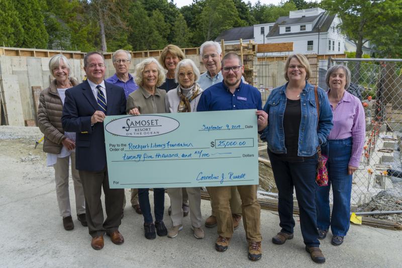 Samoset Resort presents the Rockport Library Foundation with a $25,000 donation to the new library building campaign. L-R: Bonnie Gibbons, Regional General Manager Cornelius Russell, Nick Ruffin, Co-Chairwoman Joan Welsh, Denise Munger, Sally Cook, Co-Chairman Bill Leone, Library Director Ben Blackmon, Ann Filley and Helen Shaw. (Photo courtesy Ni Rong)