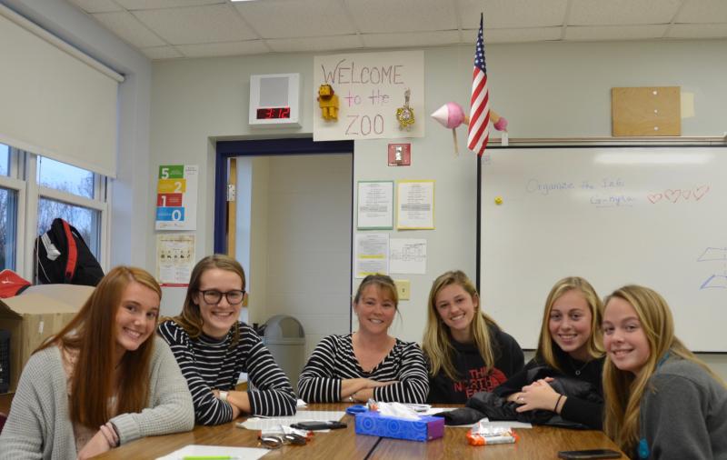 Members of the Camden Hills soccer team sat down Nov. 18 to reflect on the season including, from left, Anya Babb-Brott and Lexi Heidorn, head coach Meredith Messer, Kristina Kelly, Ella Pierce and Emmie Wood. (Photo by Lynda Clancy)