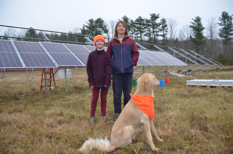 Elsie and Cameron Pinchbeck and their dog Ollie. They got the solar ball rolling in Hope in 2018. (Photo by Lynda Clancy)