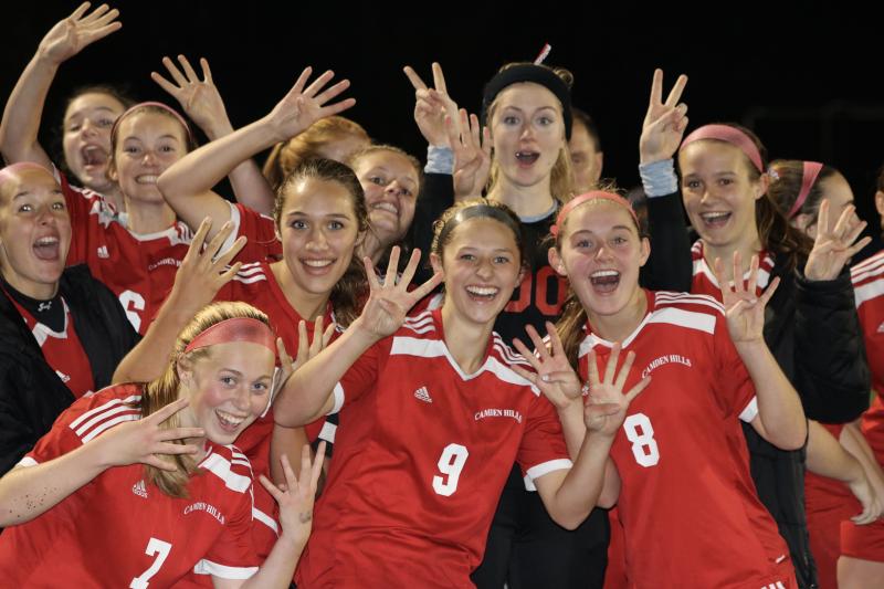 Members of the Camden Hills girls soccer team after winning its fourth consecutive state championship Nov. 9. (Photo courtesy Vin Contento)
