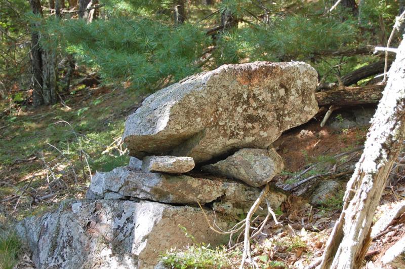 This stack of large boulders is part of the grouping of aligned structures, including the cairn, altar and propped stone near the summit of Ducktrap mountain. (Photo courtesy Dennis Cerrotti)