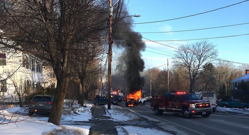 Both drivers were away from the flames by the time a pickup truck became fully engulfed with fire. (Photo by Steve Cartwright)