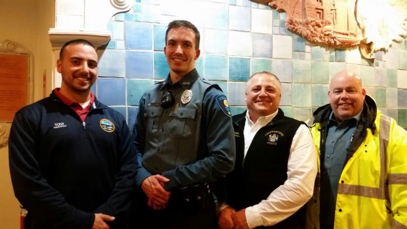 Rockport police were present to celebrate the pinning of Officer Poole. From left, Officer Tony Del Vecchio, Poole, Camden/Rockport Police Chief Randy Gagne, and Sgt. Jim Moore. (Photo by Sarah Shepherd)